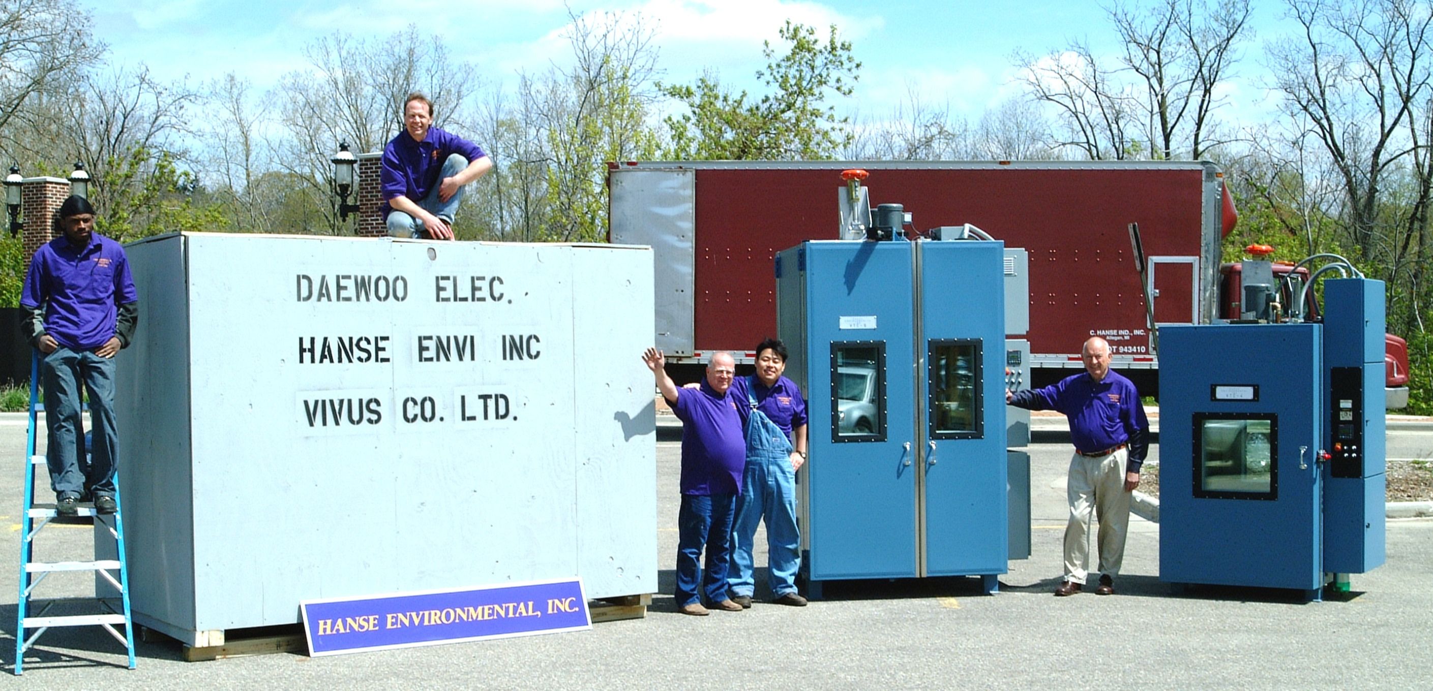 The Hanse team in Allegan with a crated chamber and two chambers ready for shipment