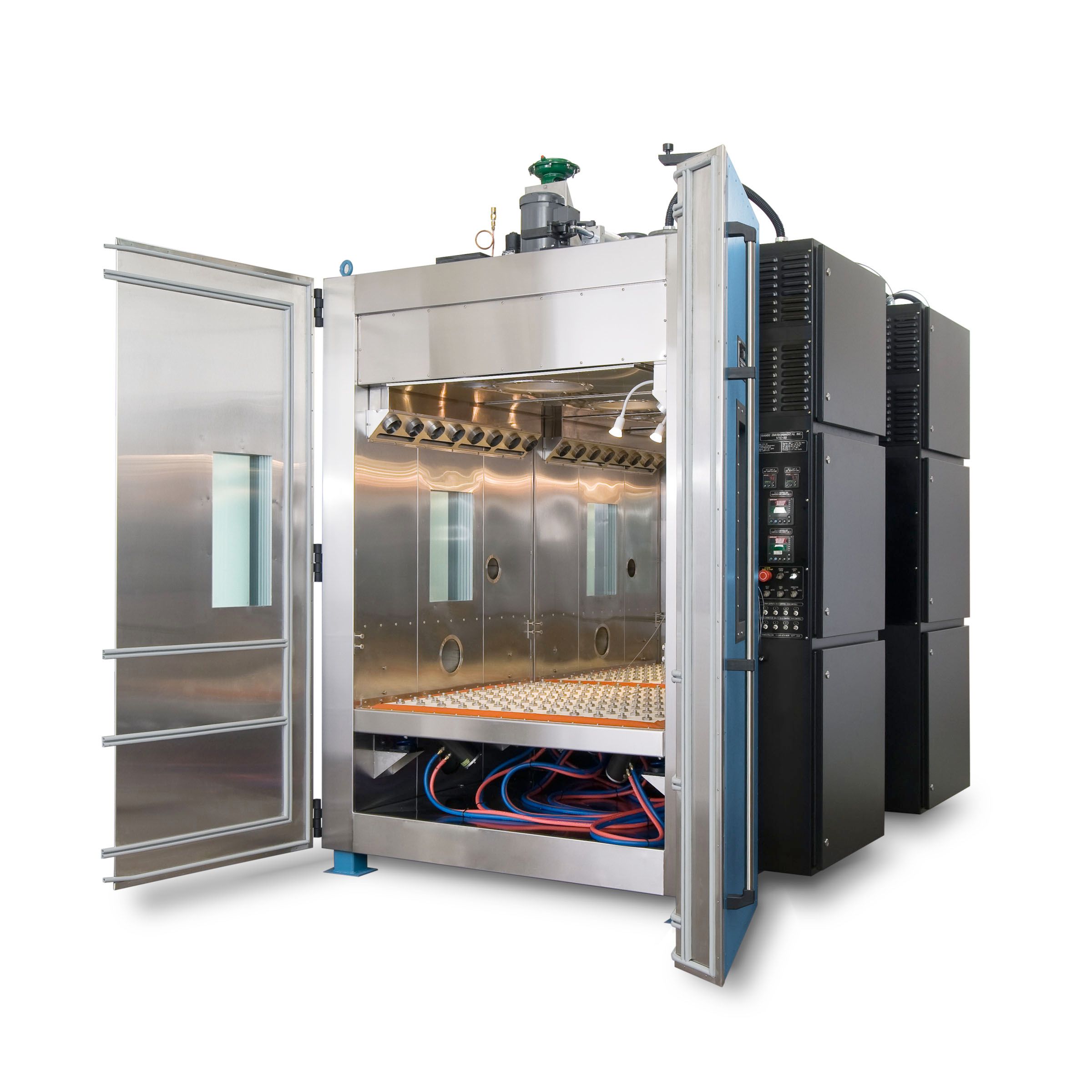 Hanse VTC-32 HALT/HASS chamber with its bi-parting front doors open, showing the vibration table and the workspace