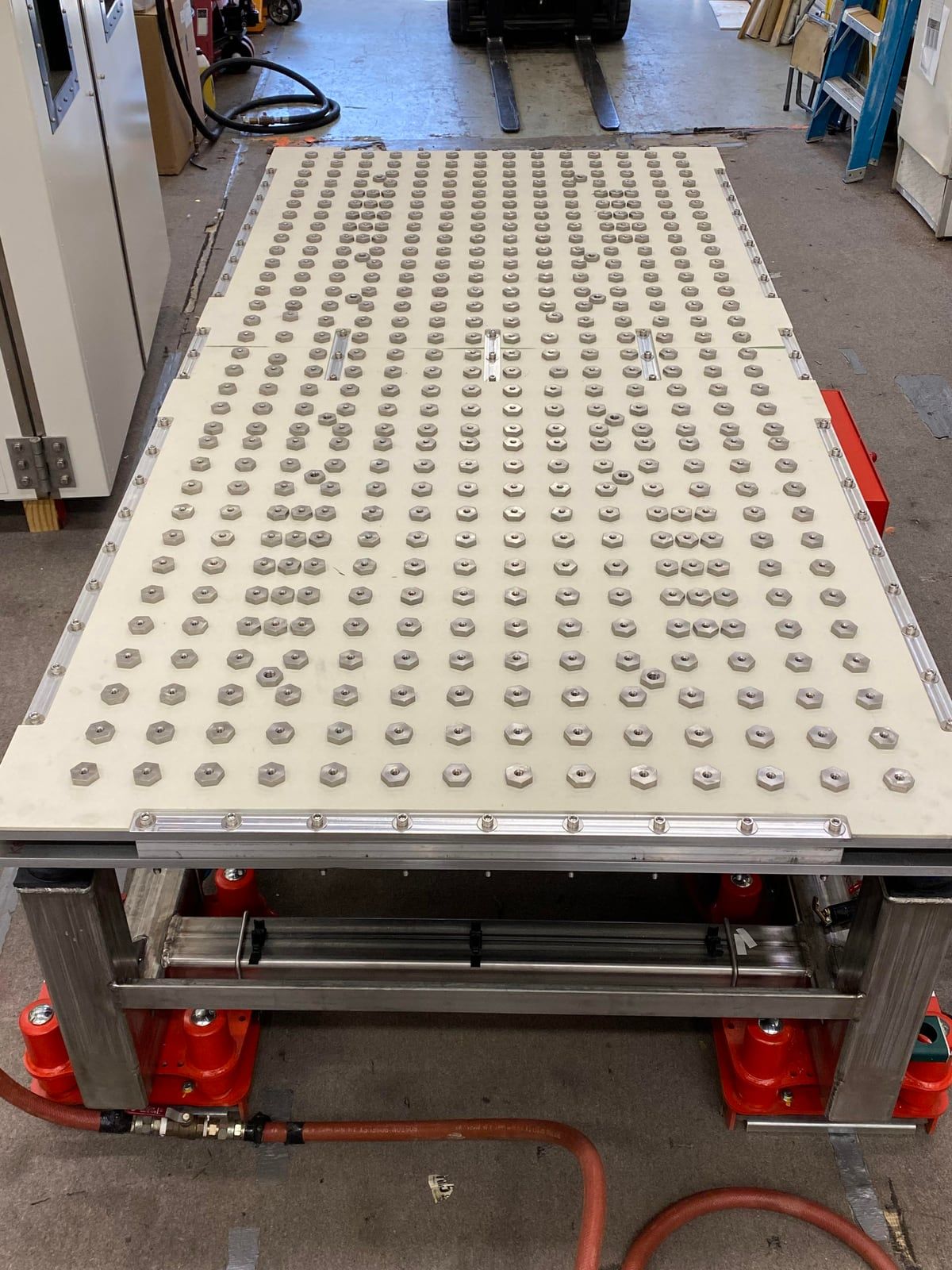 Custom Hanse vibration system mounted on air casters
